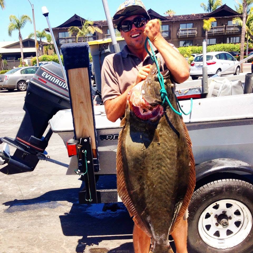 Angler with California halibut catch