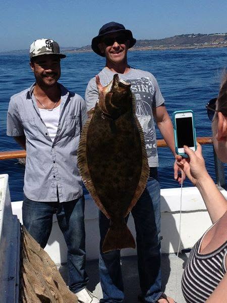 Anglers with California halibut catch