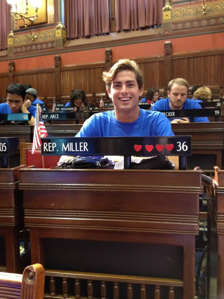 Seated at the Connecticut State House during a civic recognition visit