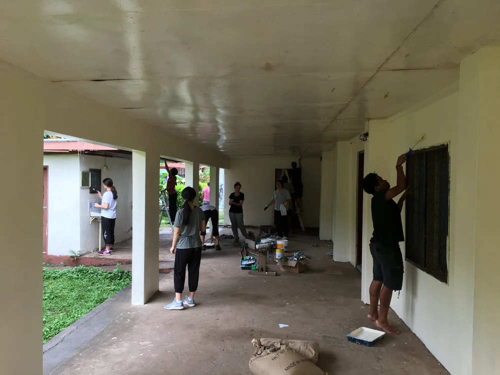 Painting the rebuilt school building