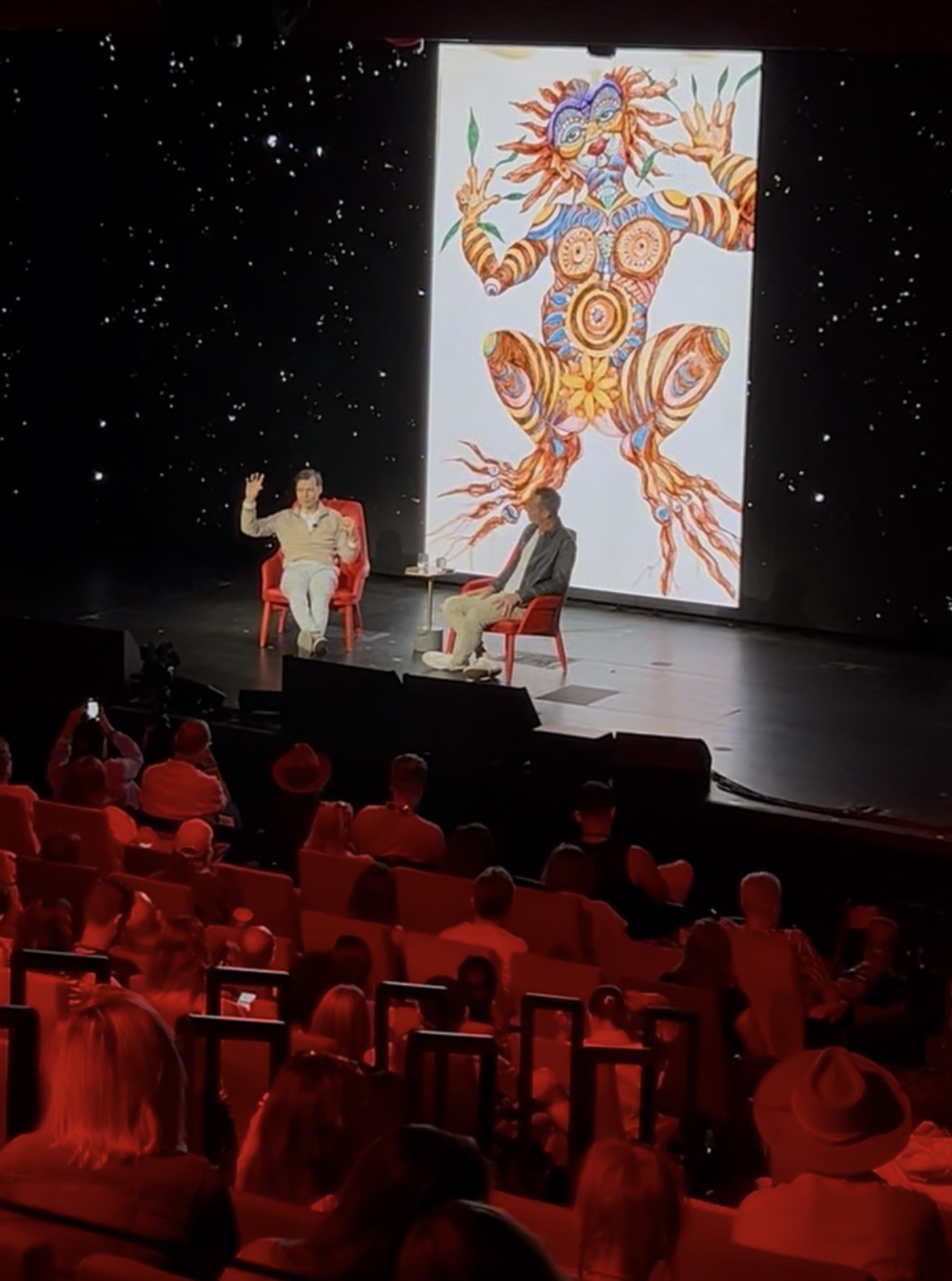 Fireside chat on stage at a Summit event