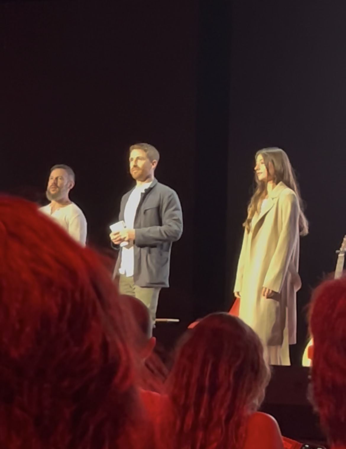 Speakers gathered on stage at a Summit event