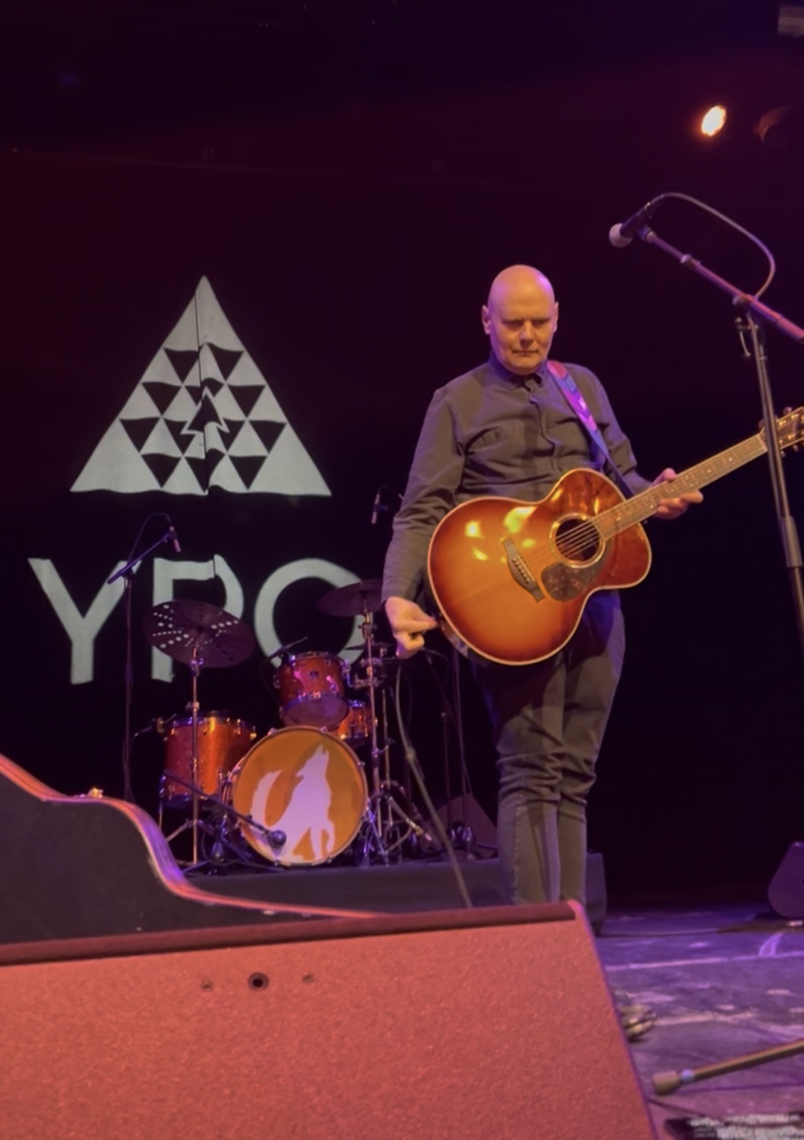 Musician performing on stage at a YPO event