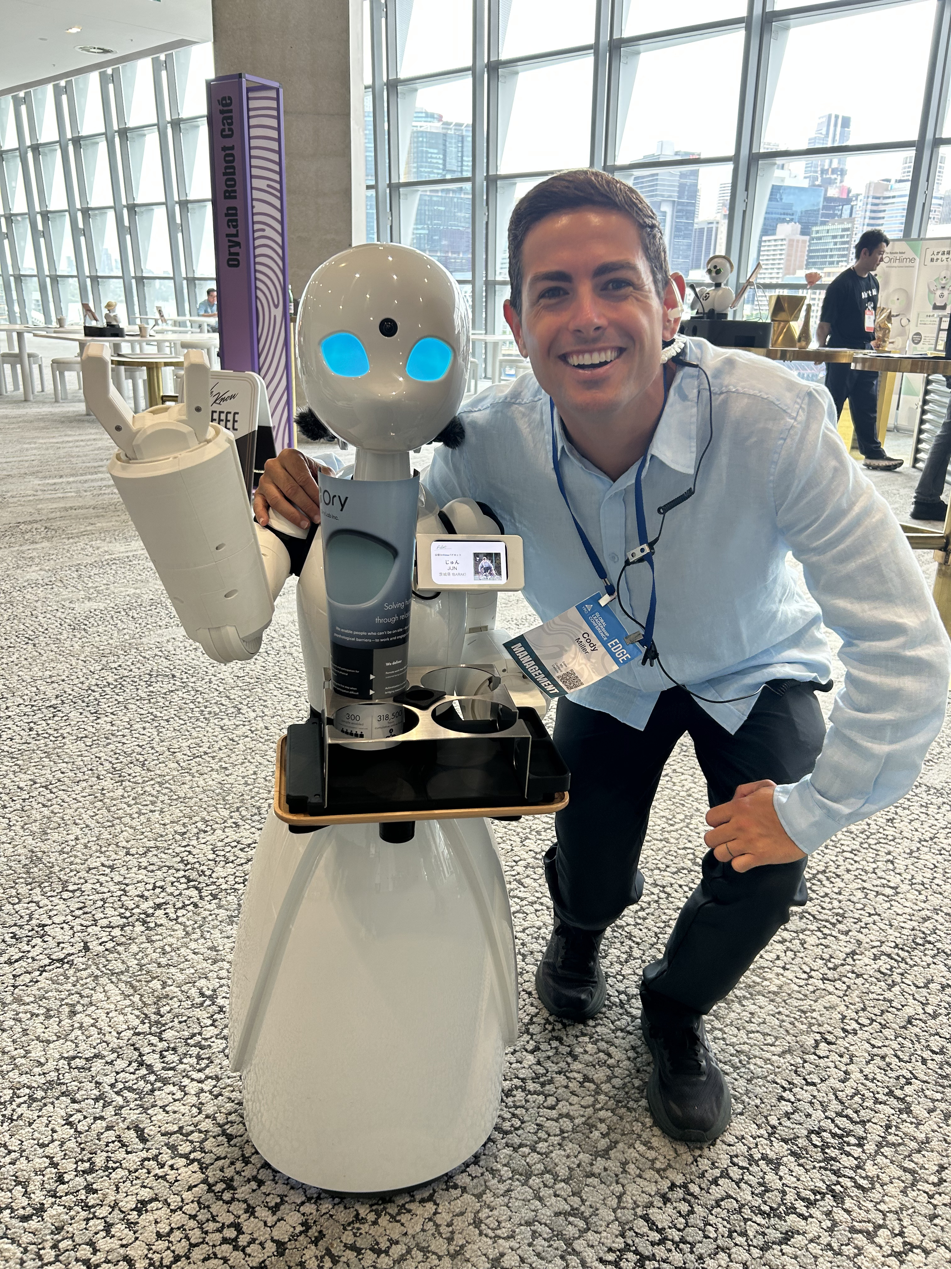 With a robot at the OryLab Robot Café, YPO EDGE Sydney